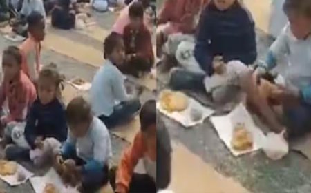 ठंड में बच्चों को नीचे बिठाया, रद्दी वाले कागज पर परोसा हलवा-पूड़ी; सिस्टम की खुली पोल